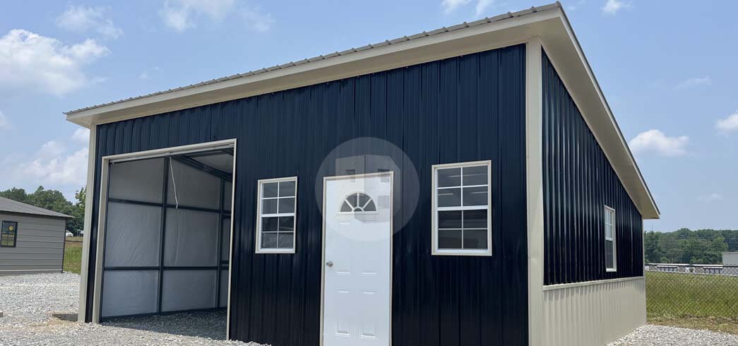 Single-bay black metal garage with a brown roof, tan trim, an open roll-up bay and a walk-in door with a fan window